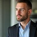 Photo of Mark T., an apartment manager, appearing thoughtful and appreciative.